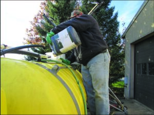 ReStore 3G being poured into a sprayer.